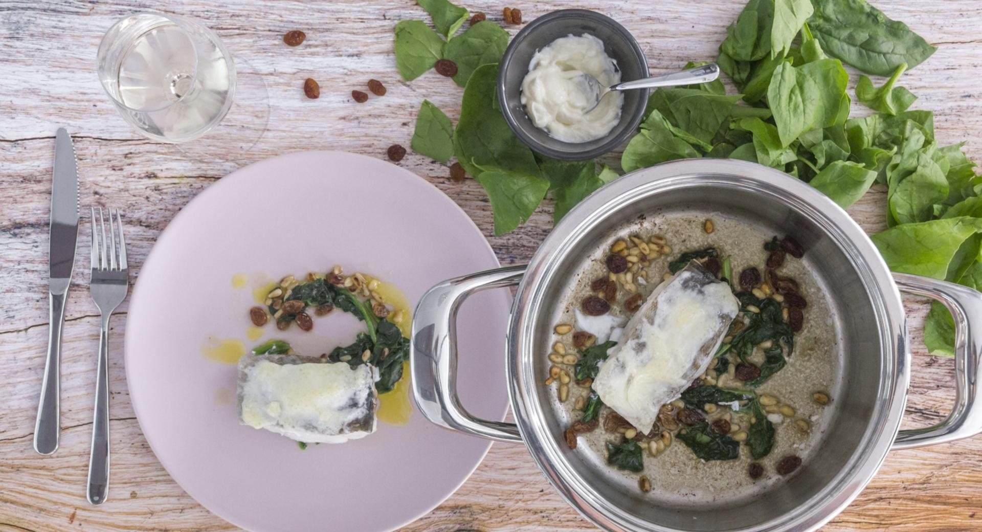 Gratinated cod with spinach, raisins and pine kernels