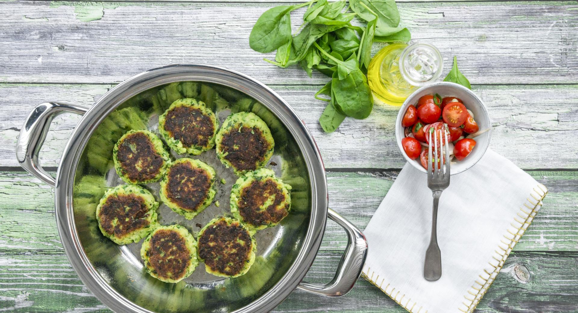 Potato burger with mini tomato salad