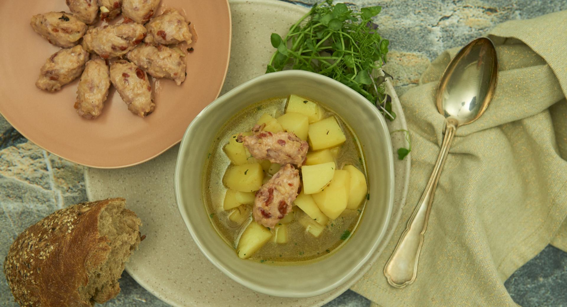 Potato and herb stew with spicy bacon dumplings