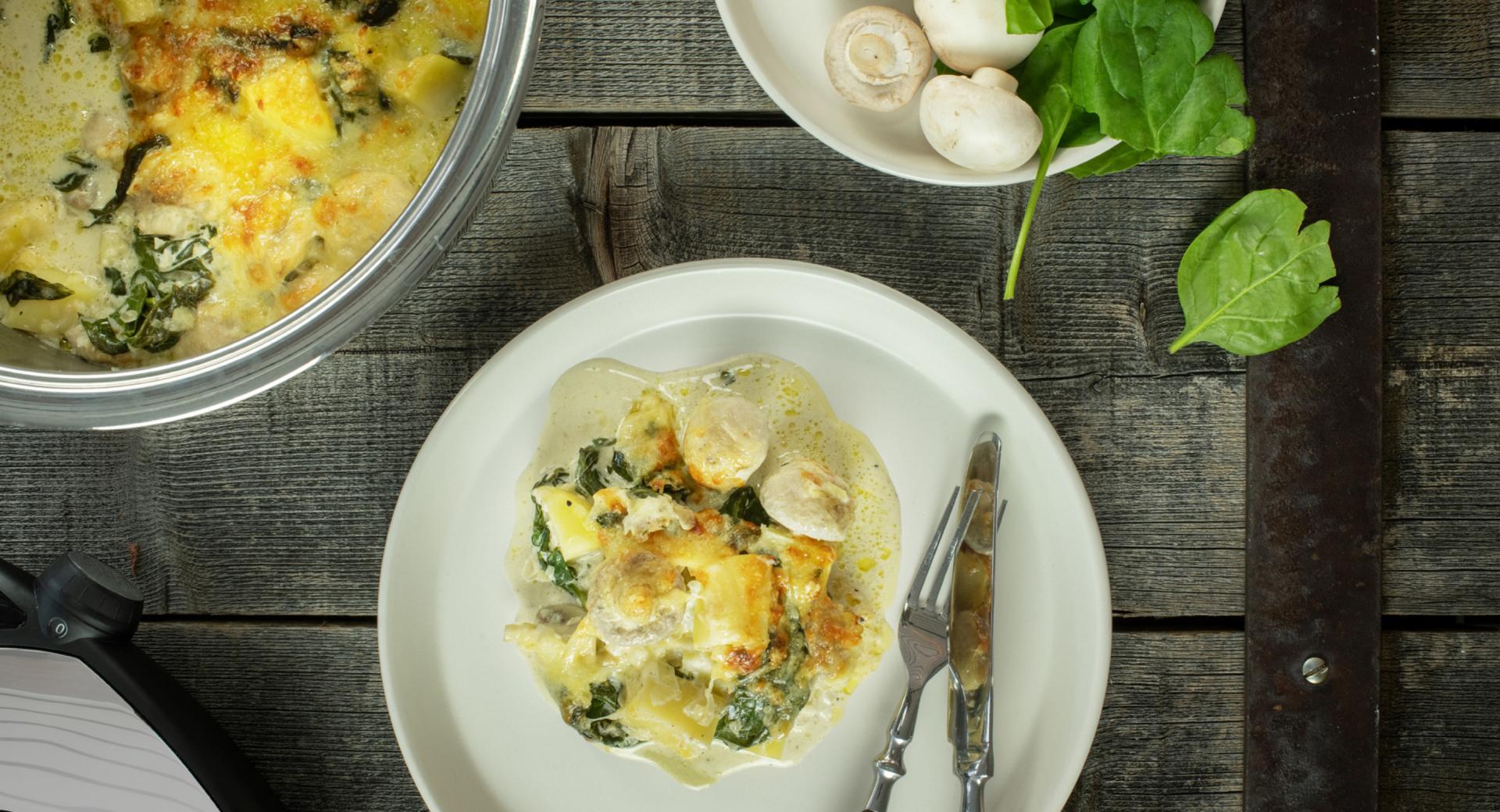 Mushroom and spinach ragout au gratin with potatoes