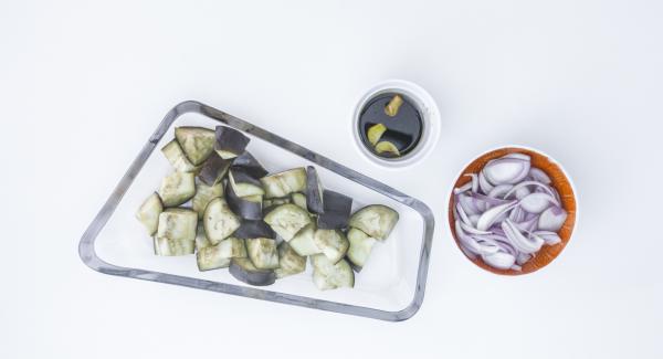 Sprinkle the dressing on top of the steamed eggplant and add some fresh onion rings on top.