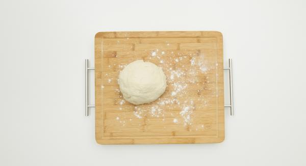 Divide the dough into 8 portions and roll out thinly. Chop sheep's cheese, parsley leaves and chilli flakes in the Quick Cut to prepare a filling. Place a bit of the filling on one side of the dough and fold the other side over.