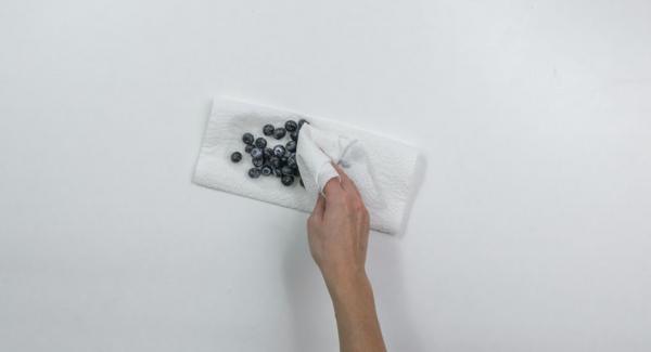Wash blueberries, select them and dab dry on kitchen paper.
