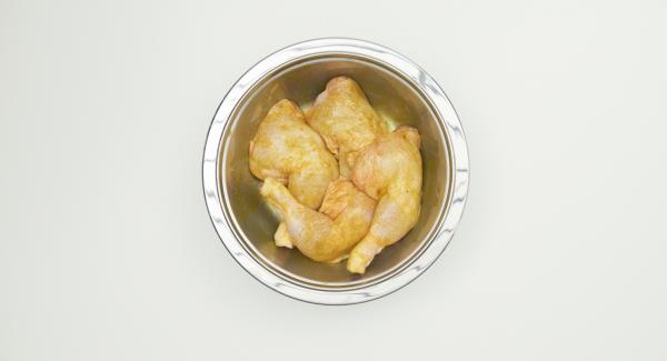 Mix turmeric, cumin, coriander and salt with olive oil and rub chicken legs with it.