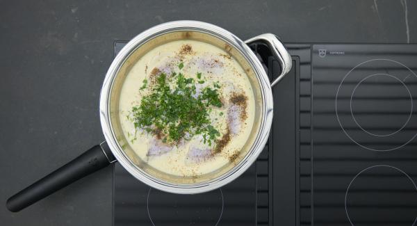 Pour the fish into the hot sauce, set at low level and leave to stand for approx. 5 minutes with the lid on, depending on the size of the fillets. Finely chop the herb leaves, add, season and serve.