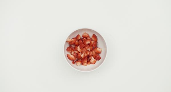 Wash, clean and cut the strawberries into small pieces.