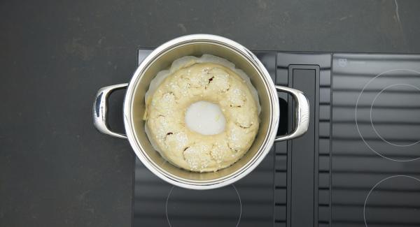 Place pot on stove and set it at low level. Place Navigenio overhead and set at low level. while the Navigenio flashes red/blue, enter approx. 40 minutes in the Audiotherm and bake until light brown.