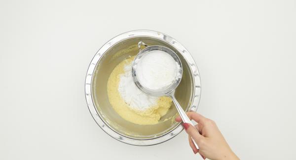 Mix flour and starch, sieve into the dough using a kitchen sieve and mix well.