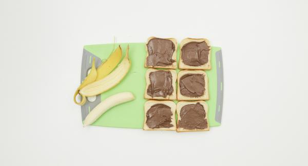 Spread the chocolate cream on half of the toast slices. Peel the banana, cut into slices and spread over the toasts. Cover with the remaining toast slices.