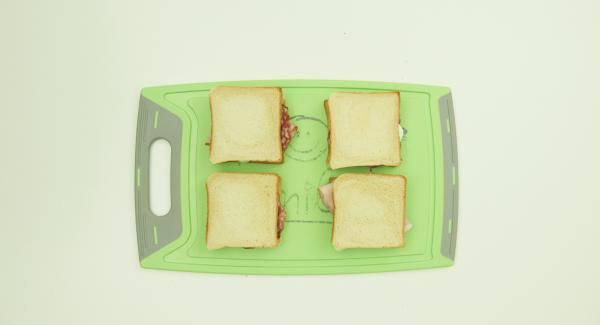 Cover half of the toasts with your preferred ingredients and cover with the remaining toasts.