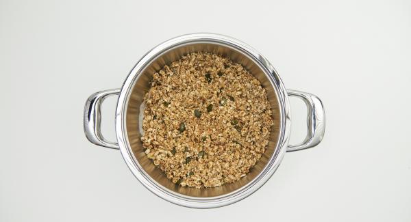 Place Navigenio overhead and set it at low level. Bake for approx. 30 seconds, stir Granola and repeat until a nice browning is achieved all around. Remove the granola from the pot and allow to cool.