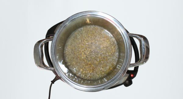 Drain the lentils and rice from water and add to onions with water, oil and salt.