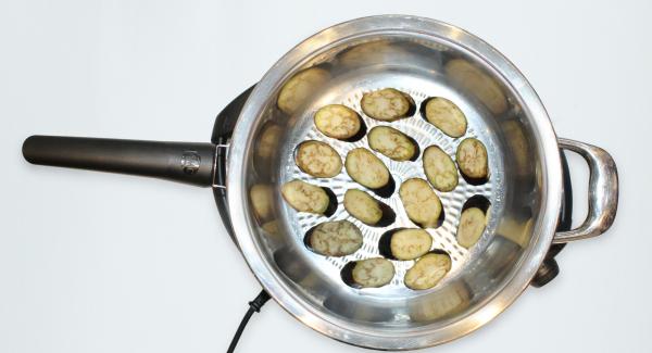 As soon as the Audiotherm beeps on reaching the roasting window, set at level 2 and lift the lid, let the eggplant get roasted on both sides, remove put it aside.