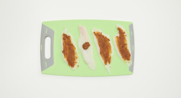 Grate half of the lime skin and mix well with peanut butter, Sambal Oelek and 1 tsp fish sauce. Dry fish fillets, spread each with ¼ of the peanut paste evenly and roll tightly, place in the Softiera insert.