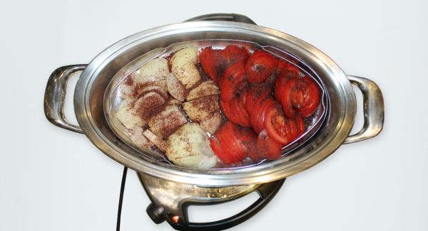 Place the Oval strainer on top of the meat. Add tomatoes and onions slices. Season with sumac and cover.