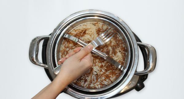 At the end of cooking time, remove Softiera bowl, place it into the inverted lid and serve food.