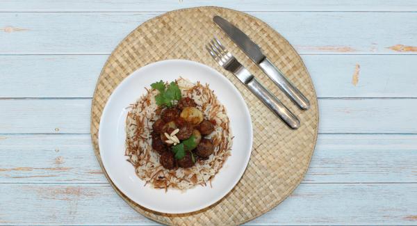 At the end of cooking time, remove Softiera bowl, place it into the inverted lid and serve food.