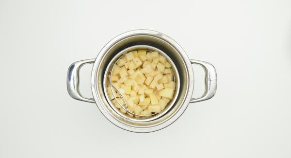 Open Secuquick, remove Softiera insert and pour out the remaining water from the pot. Put the celery and potato cubes back into the pot. Add butter, finely crush celery and potatoes, gradually adding milk.