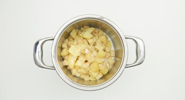 Open Secuquick, remove Softiera insert and pour out the remaining water from the pot. Put the celery and potato cubes back into the pot. Add butter, finely crush celery and potatoes, gradually adding milk.