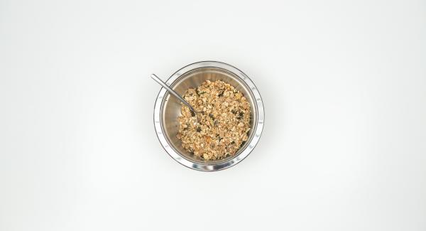 Warm up coconut oil, mix with honey and cinnamon, add to the granola mixture and mix well.