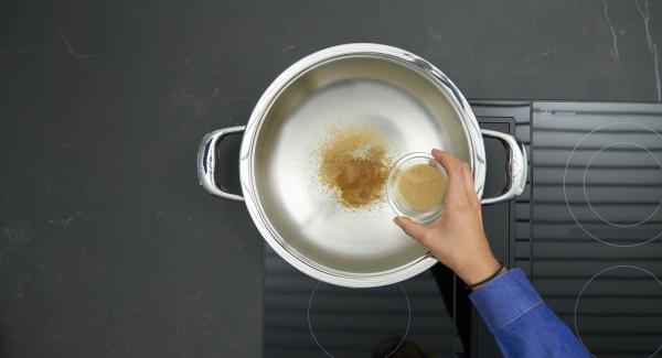 Add a little sugar to Eurasia, put on hob and set it at highest level. As soon as the sugar begins to melt reduce to low level. Gradually add remaining sugar and caramelize everything lightly.