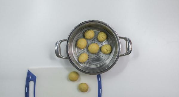 Grease the Combi sieve insert with butter and place the dumplings inside.