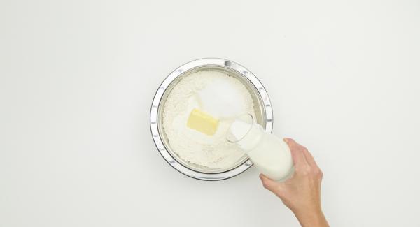 Mix flour, dry yeast and salt in a bowl and make a slot. Add sugar, milk and butter and knead to a smooth yeast dough. Cover and leave to rise for approx. 45 minutes in a warm place until the volume has increased considerably.