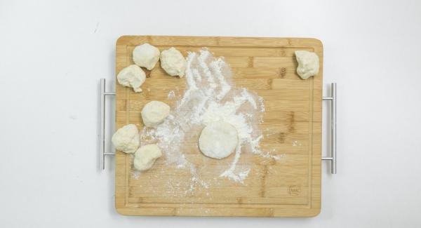 Divide the dough into 8 portions and roll out thinly.