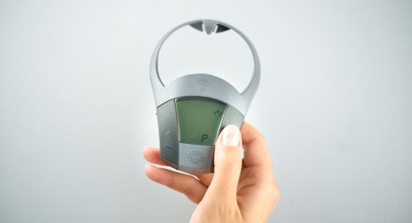 Cover the pot with Secuquick softline and close. Set Navigenio to  "A". Switch on Audiotherm, enter cooking time "P", fit it on Visiotherm and turn until the soft symbol appears.