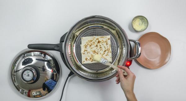 Bake the first side for about 1 minute. Turn Börek and finish baking for about 1 minute. Brush with a little soft butter if desired.