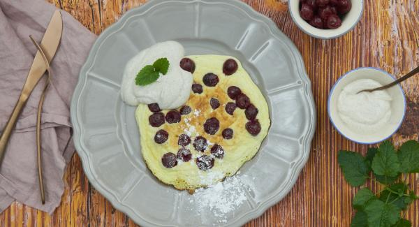 Dust the finished omelets with icing sugar and serve warm with yoghurt.