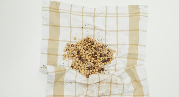 Place the nuts on a clean tea towel, remove the brown skin of the nuts by rubbing them vigorously.