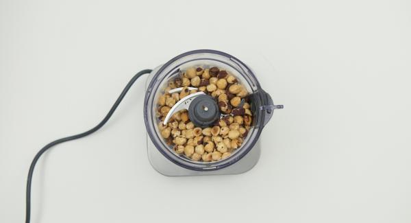 Chop the nuts very finely in a blitz chopper of a food processor: if possible, until a creamy puree is obtained.