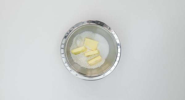 Put the flour, coconut flakes, sugar, salt and butter in a mixing bowl and mix to crumbles. Refrigerate for about 30 minutes.