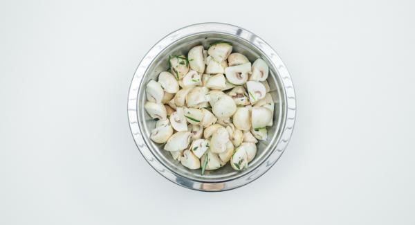 Peel the garlic and cut into slices. Pluck herb twigs into small pieces. Mix everything with the olive oil. Peel the garlic and cut into slices. Pluck herb twigs into small pieces. Mix everything with the olive oil.