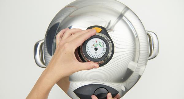 At the end of the cooking time, place Secuquick in the inverted lid and let it depressurize by itself.
