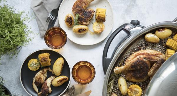 Roast chicken with potatoes and corn